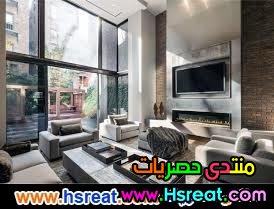 غرفة معيشة فيلا بواجهة زجاجية.jpg